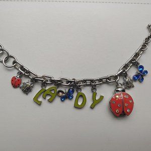 Fossil Ladybug bracelet toggle watch